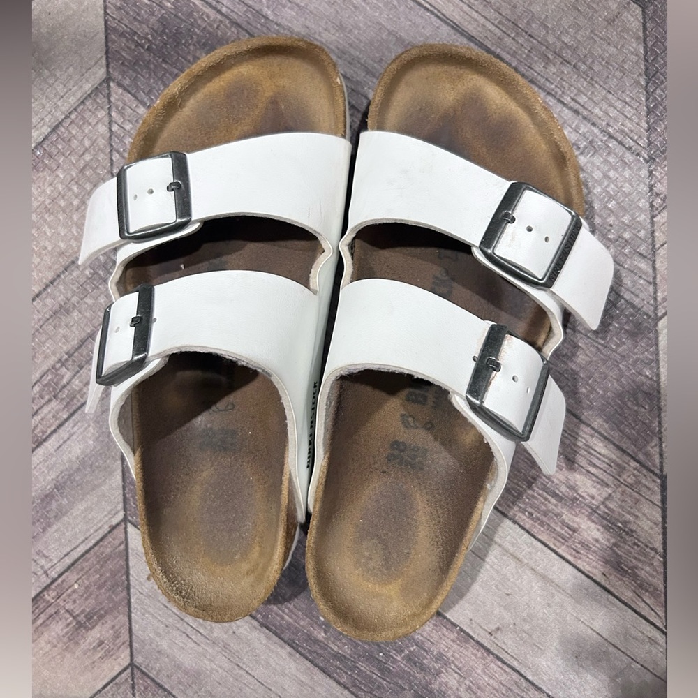 White Birkenstocks Arizona,2 straps, Size 38; 7-7.5. Previously worn.